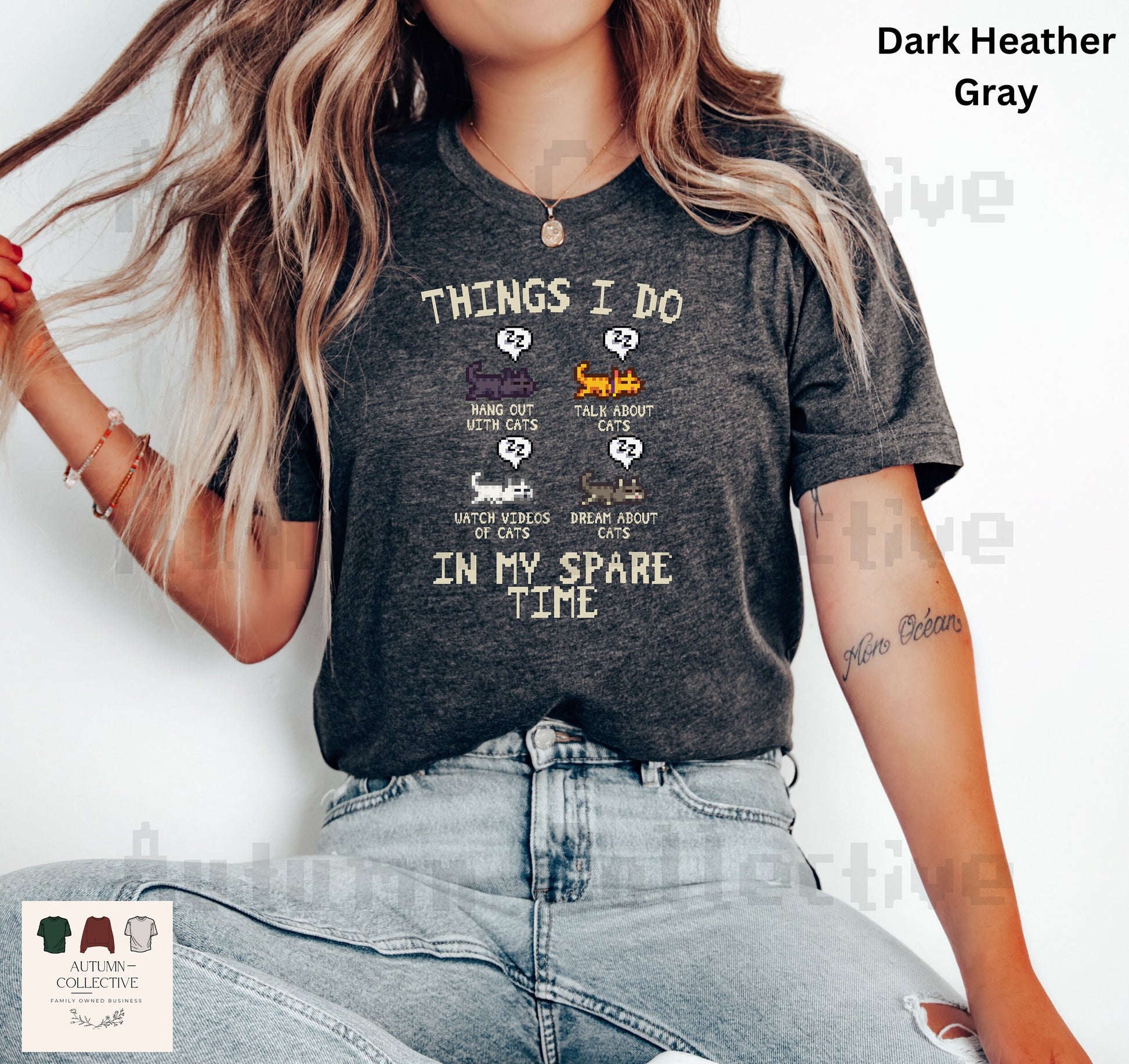 Original Things I do in my spare time Stardew Valley Shirt. Four sleeping cats in the colors black, orange/yellow, white, and grey - captions underneath each cat; Hang out with cats, talk about cats, watch videos about cats, and dream about cats.