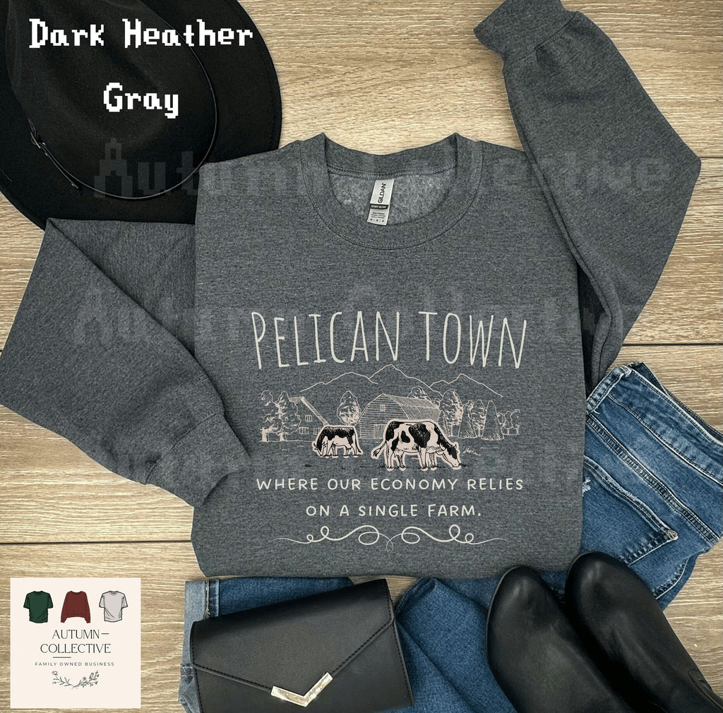 Pelican Town Sweatshirt - Where our economy relies on a single farm.