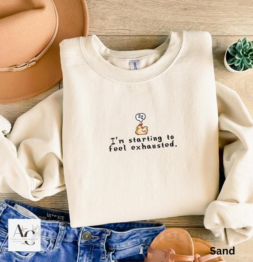 I&#39;m starting to feel exhausted stardew valley sleeping chicken unisex sweatshirt in color sand
