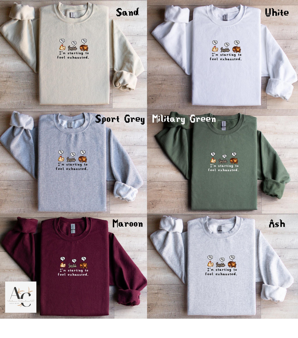 I&#39;m Starting To Feel Exhausted sleepy chicken, sleepy cat, and sleepy dog stardew valley sweatshirt in color.